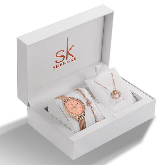 Coffret femme avec bijoux strass : bracelet, collier et montre commémorative