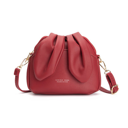 sac bandoulière au design original avec oreilles de lapin, mignon et tendance, parfait pour un style ludique et moderne.