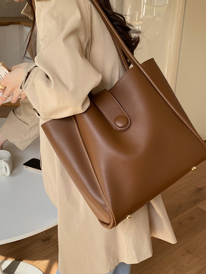 Sac cabas rétro porté à une épaule, au style élégant et haut de gamme, idéal pour le travail et les trajets quotidiens.