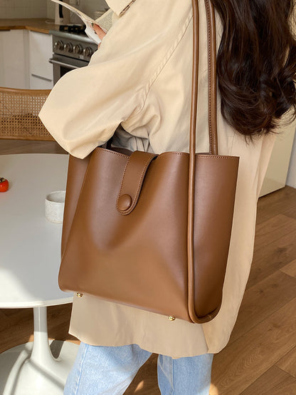 Sac cabas rétro porté à une épaule, au style élégant et haut de gamme, idéal pour le travail et les trajets quotidiens.